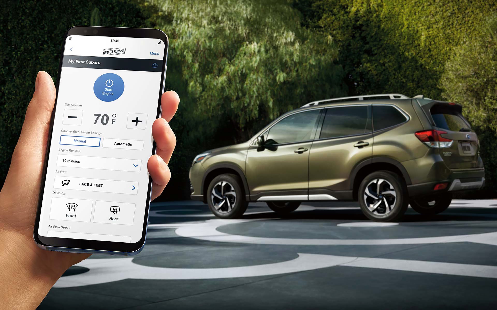 A close-up of a phone showing the Remote Engine Start with Climate Control feature of SUBARU STARLINK® Safety and Security available on the 2022 Forester. | Tindol Subaru in Gastonia NC