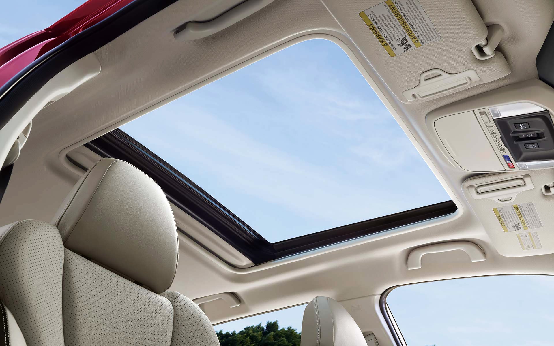A view through the power sliding panoramic moonroof on the 2022 Forester Sport. | Tindol Subaru in Gastonia NC