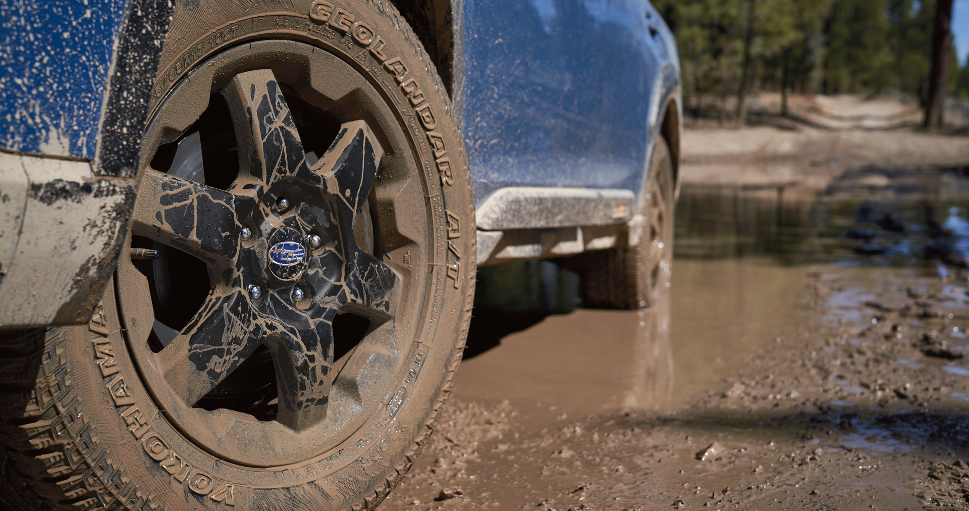 A close-up of the 17-inch off-road wheels and all-terrain Yokohama GEOLANDAR® tires on the 2023 Outback Wilderness. | Tindol Subaru in Gastonia NC